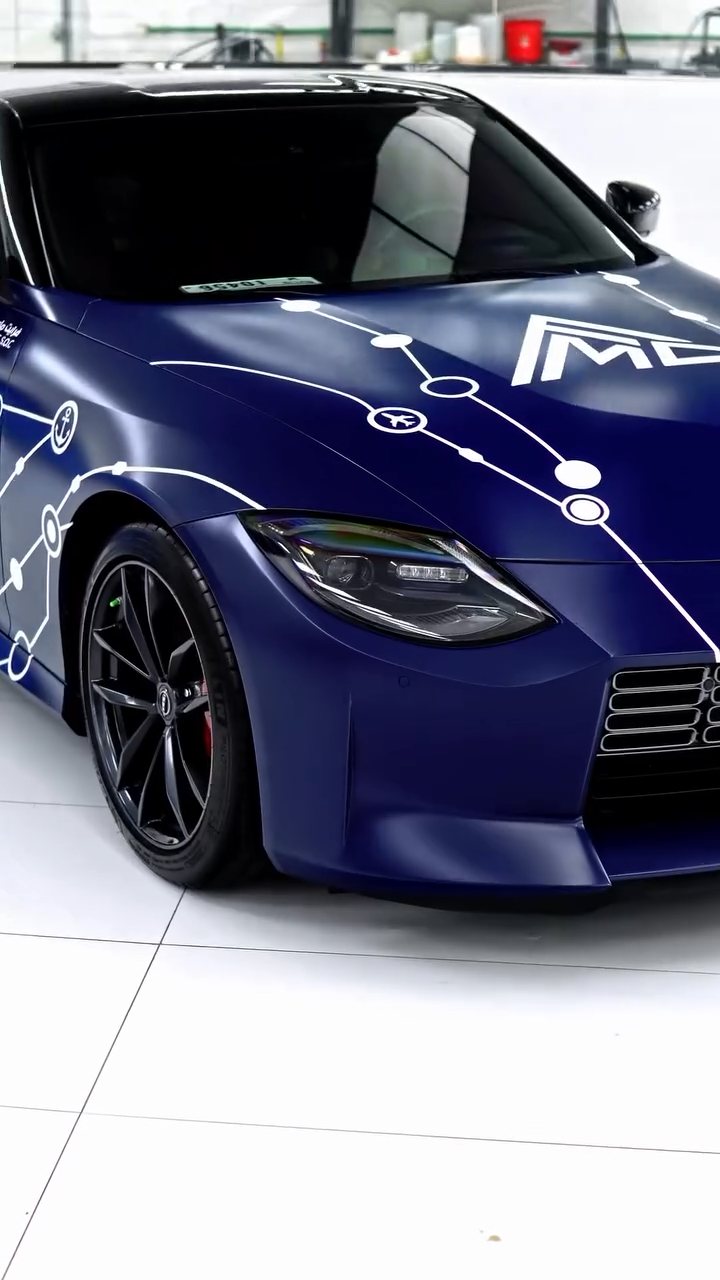 Blue Nissan Z with livery decals finished in Dubai