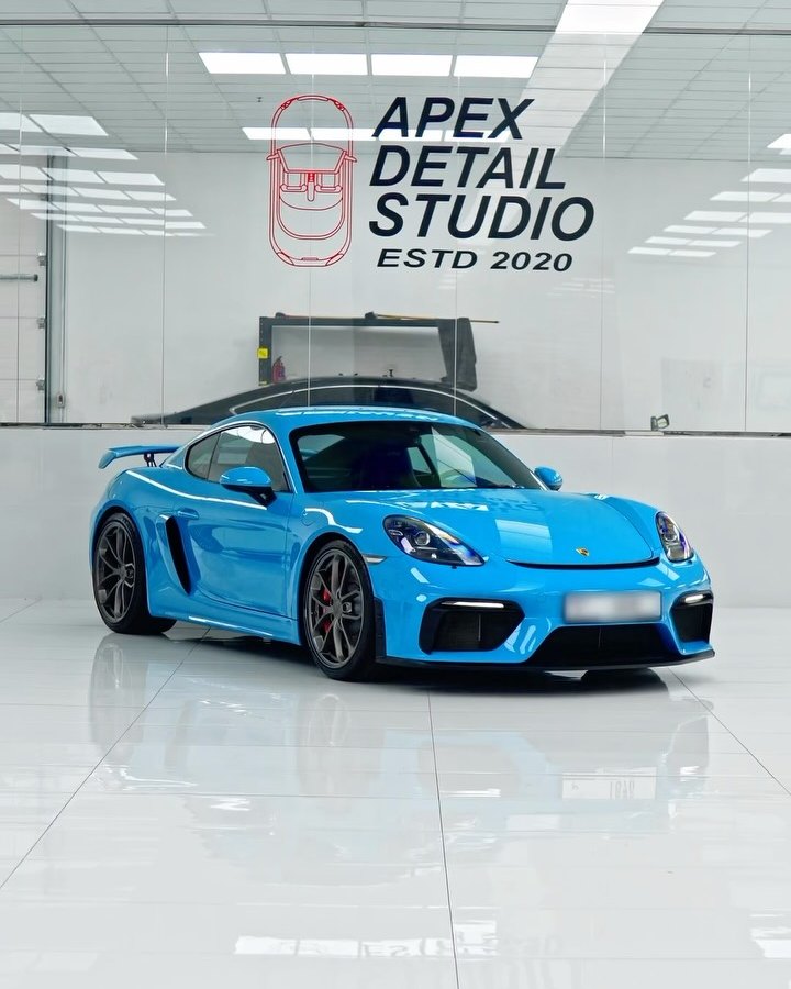 Porsche 718 Cayman GT4, blue, full window tint for privacy, heat rejection and a cooler cabin, at Apex Detail Studio in Dubai