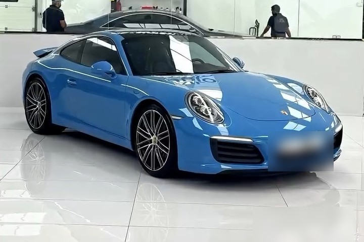 Porsche 911 Carrera after its blue colour PPF at Apex Detail Studio, Dubai