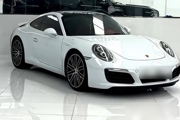 The same Porsche 911 Carrera in factory white before colour PPF