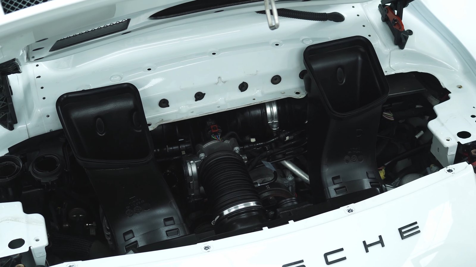 Porsche 911 GT3 engine bay after dry ice cleaning at Apex Detail Studio