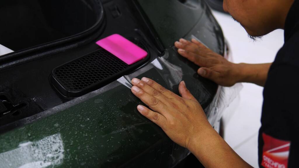 PPF pressed into the front bumper intake of a Porsche 911 GT3 Touring at Apex Detail Studio Dubai