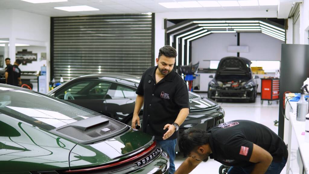 Green Porsche 911 GT3 Touring at Apex Detail Studio Dubai before PPF