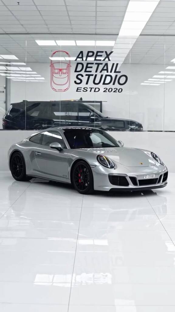 Silver Porsche 911 GTS 991.2 finished in full body PPF at Apex Detail Studio Al Quoz