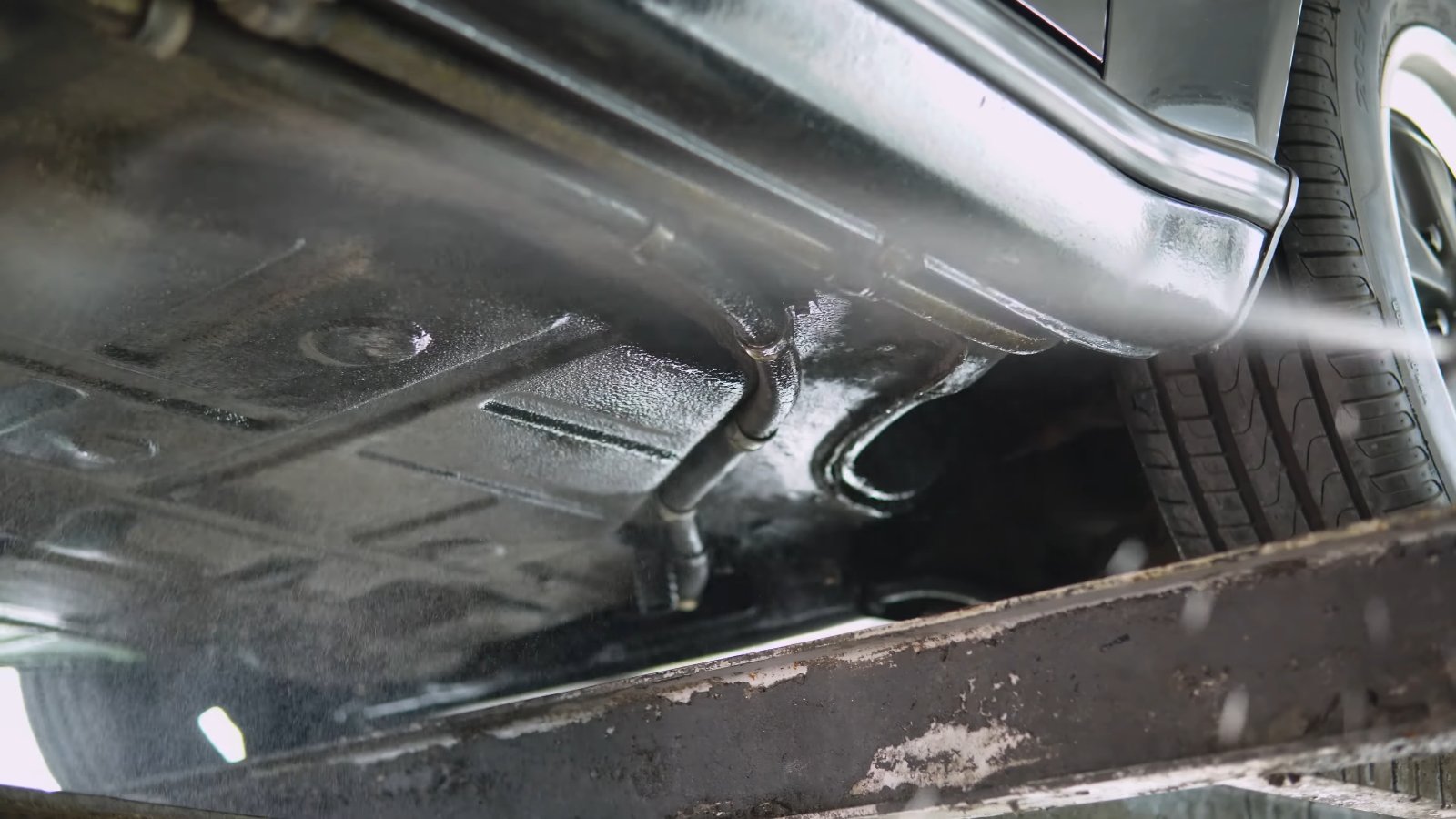 Dry ice being blasted along the floor pan of a Porsche 930 Turbo