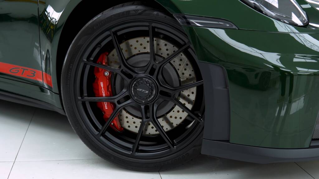 Black wheel and red calipers on a new Porsche 992.2 GT3 after full PPF in Dubai