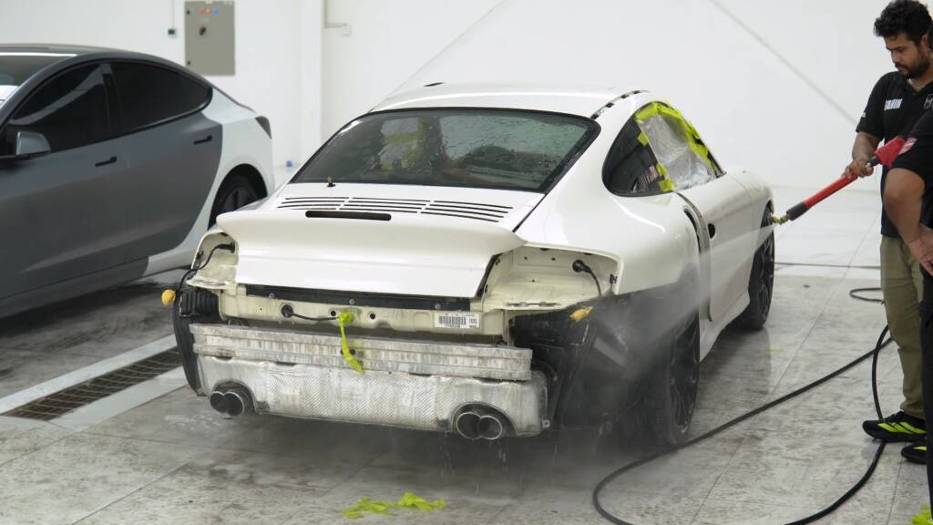 Worn and damaged Porsche 996 Turbo being washed on arrival at Apex Detail Studio Dubai