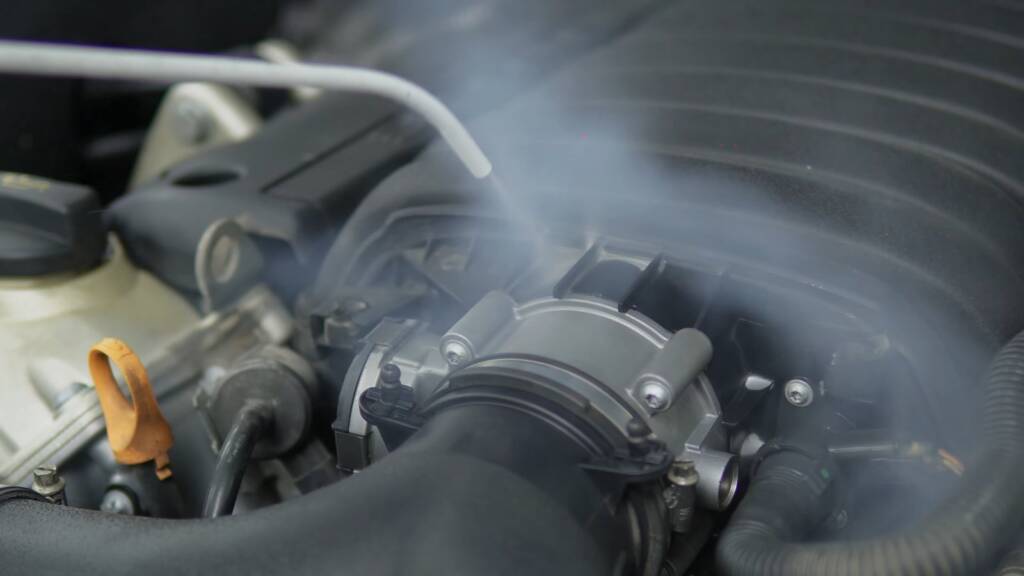 Porsche Cayenne engine intake area being cleaned in Dubai
