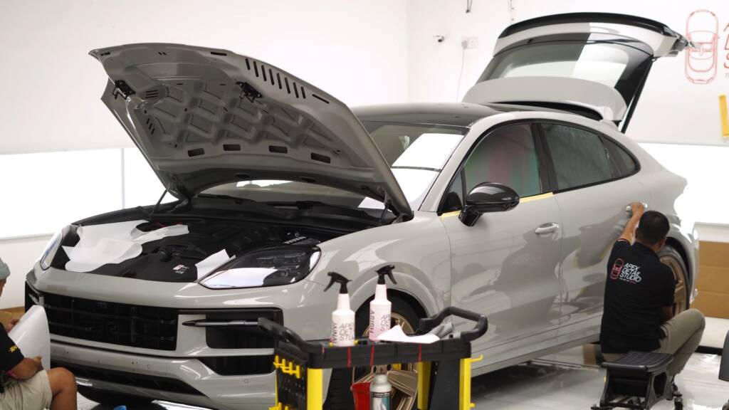 Porsche Cayenne GTS in the Apex studio with bonnet open during PPF