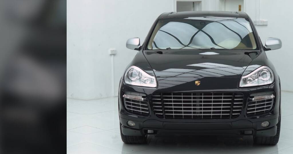 Porsche Cayenne paint restoration in Dubai: black Cayenne after paint correction and silver trim repaint at Apex Detail Studio