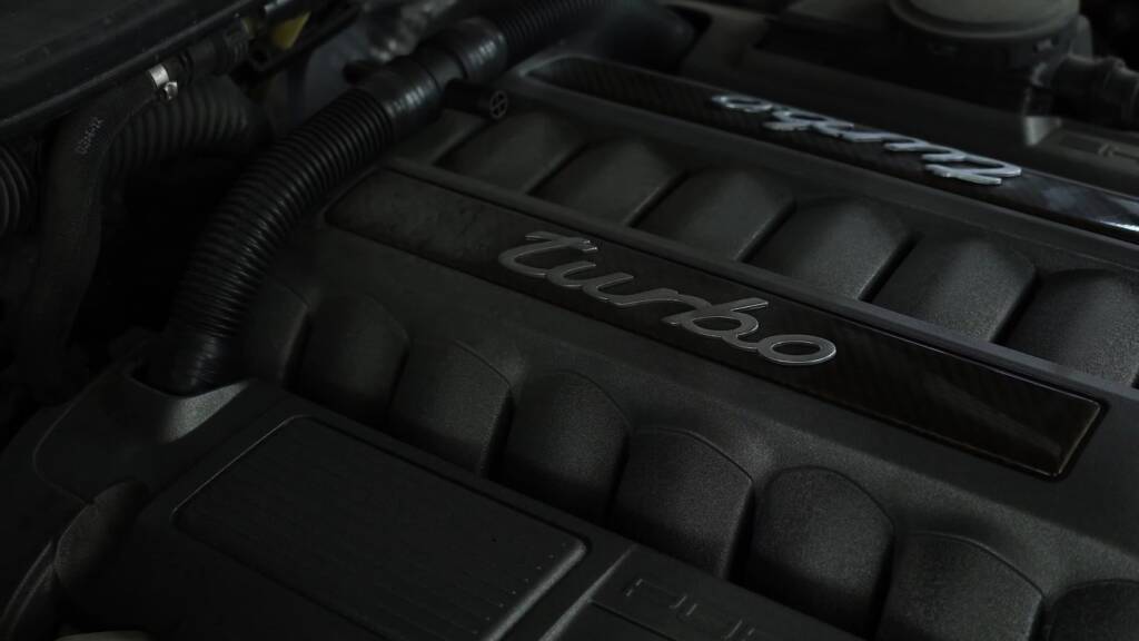 Porsche Cayenne Turbo engine cover script during dry ice cleaning