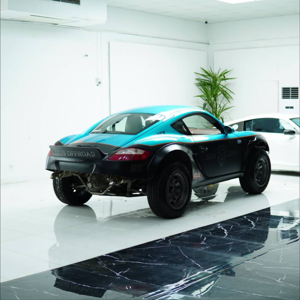 Zeus OffRoad Porsche Cayman S off road build with dual tone livery in the Apex Detail Studio showroom