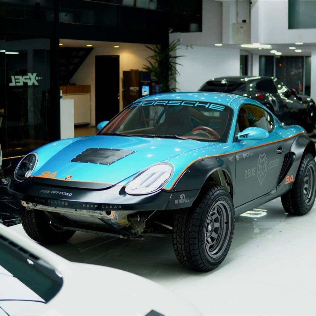 Zeus OffRoad Porsche Cayman S 987 off road build in a teal and black dual tone livery wrap at Apex Detail Studio Dubai