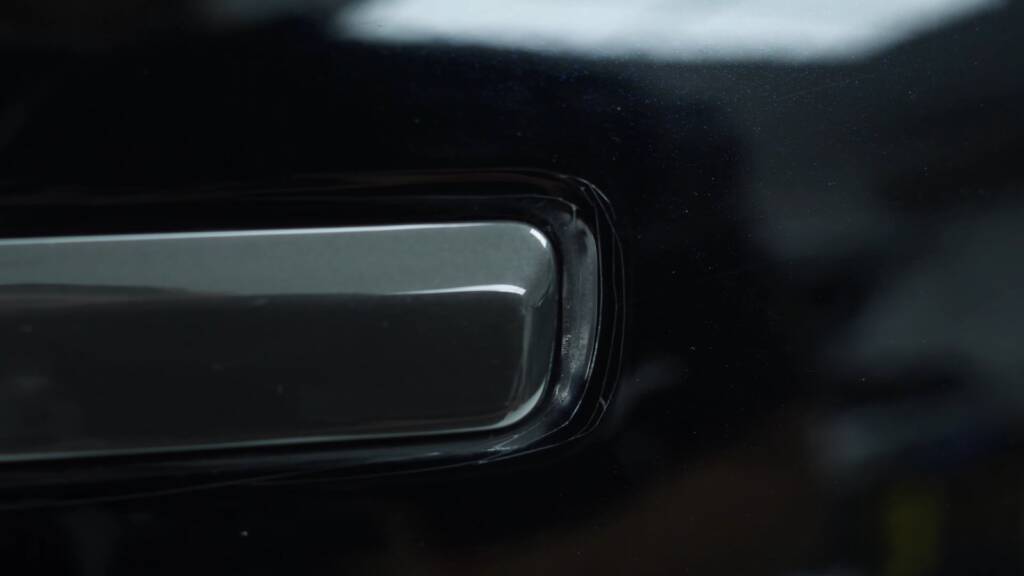Hand-cut PPF around a Range Rover door handle