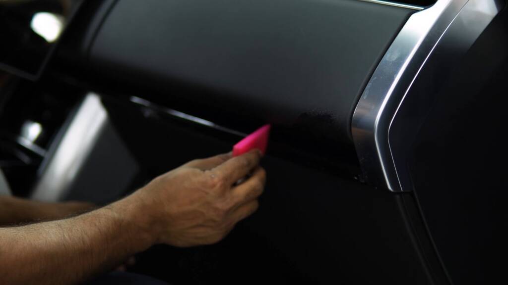 Protection film on the dashboard trim of a Range Rover