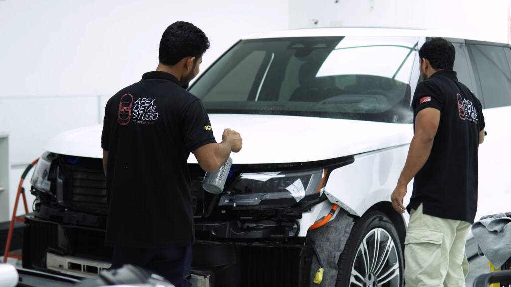 White Range Rover being prepared for gloss black colour PPF at Apex Detail Studio Dubai