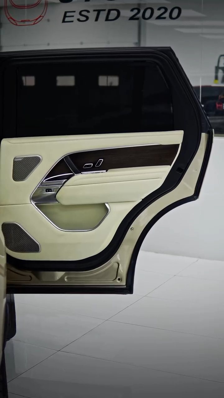 Range Rover door open showing the cream interior and grey colour PPF in Dubai