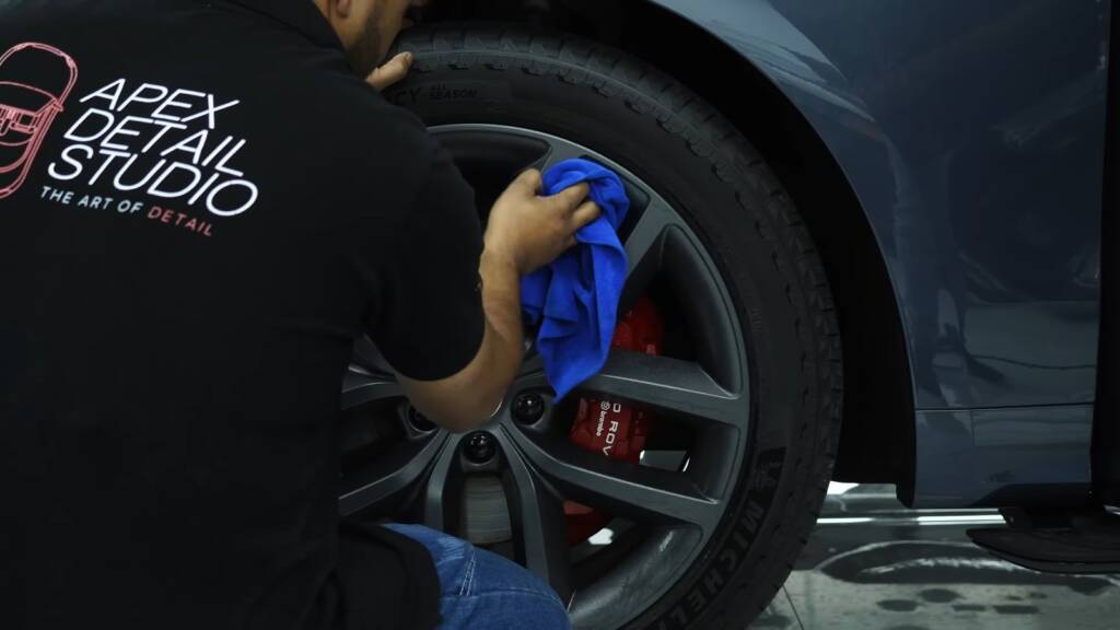 Cleaning a Range Rover Sport wheel during PPF install