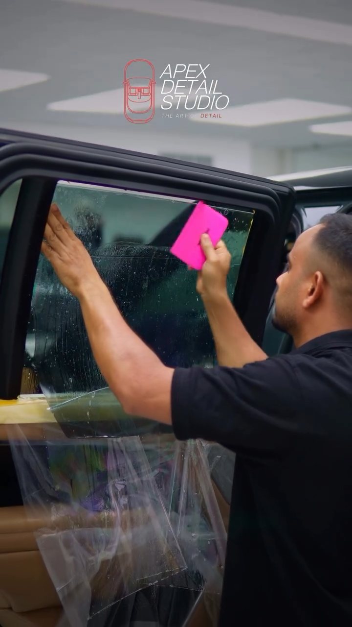 Setting the top edge of the Range Rover window tint at Apex Detail Studio Dubai
