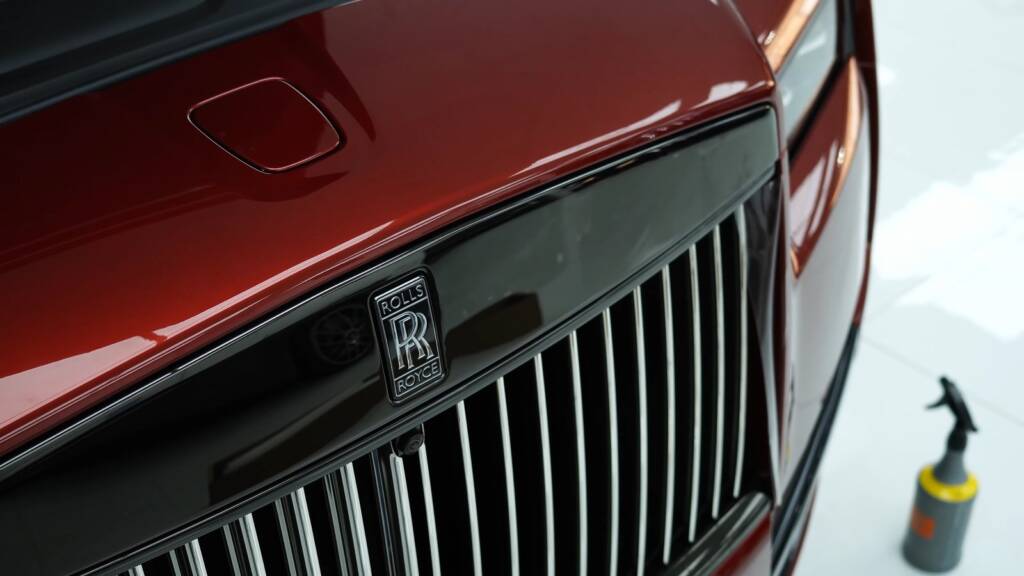 Red Rolls-Royce Cullinan grille before PPF at Apex Detail Studio