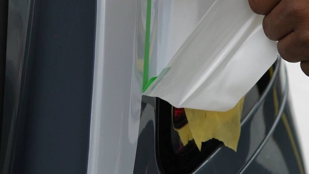 Masking tape marking the two-tone dividing line on a Rolls-Royce Ghost
