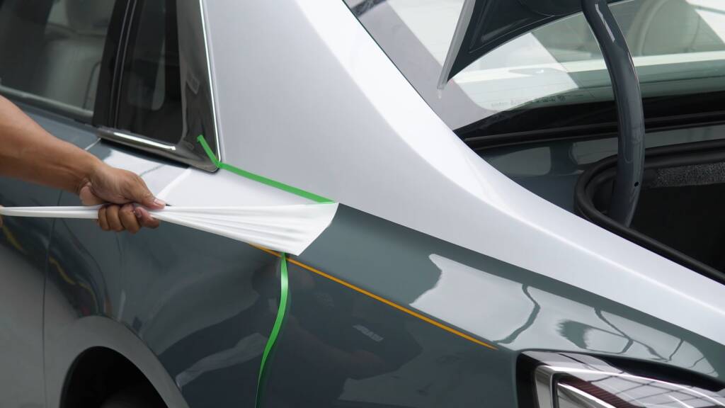 Two-tone finish taking shape at the rear pillar of a Rolls-Royce Ghost
