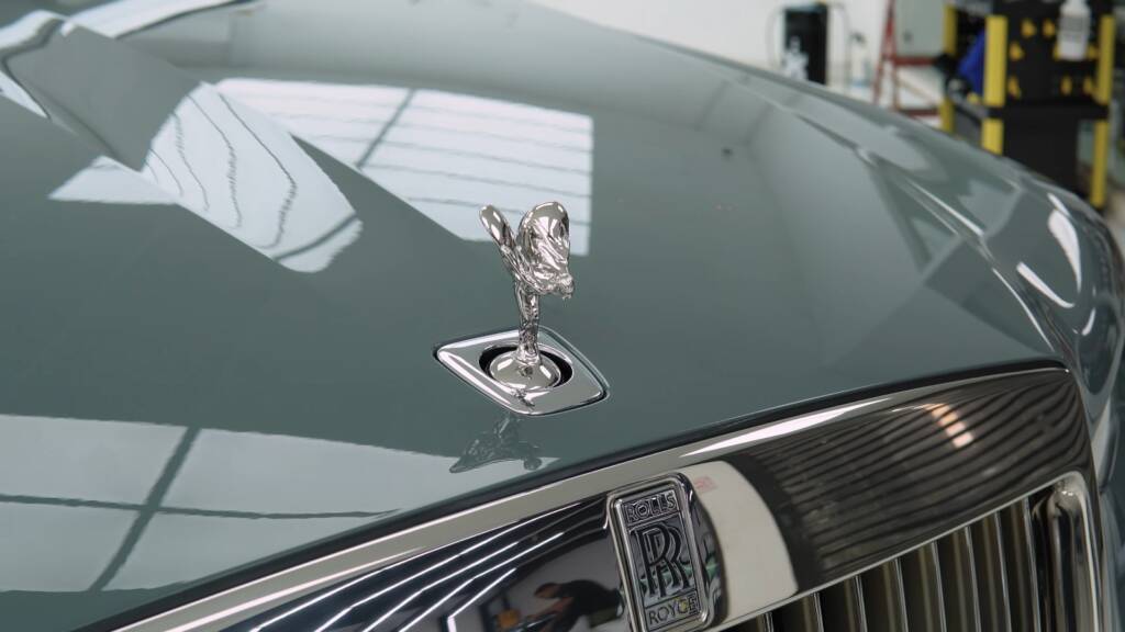 Spirit of Ecstasy and grille of a new Rolls-Royce Ghost before two-tone PPF at Apex Dubai