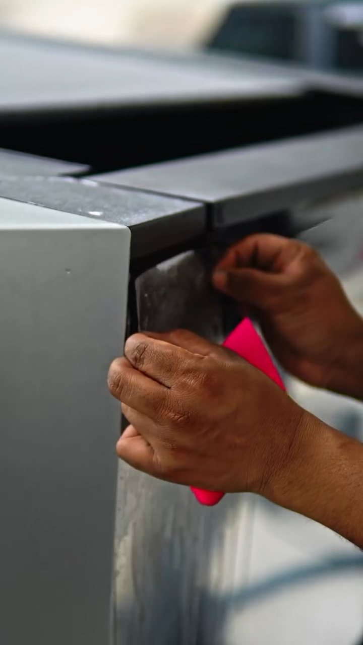 Wrapping PPF at the Tesla Cybertruck door edge in Dubai