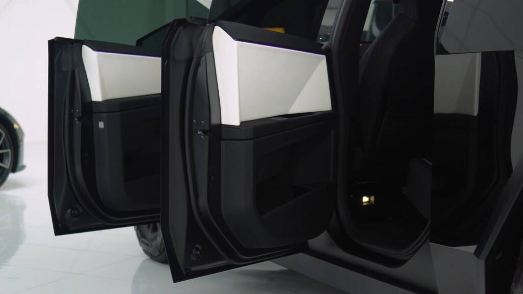 Gloss black Tesla Cybertruck door shuts finished to match the colour PPF at Apex Detail Studio Dubai
