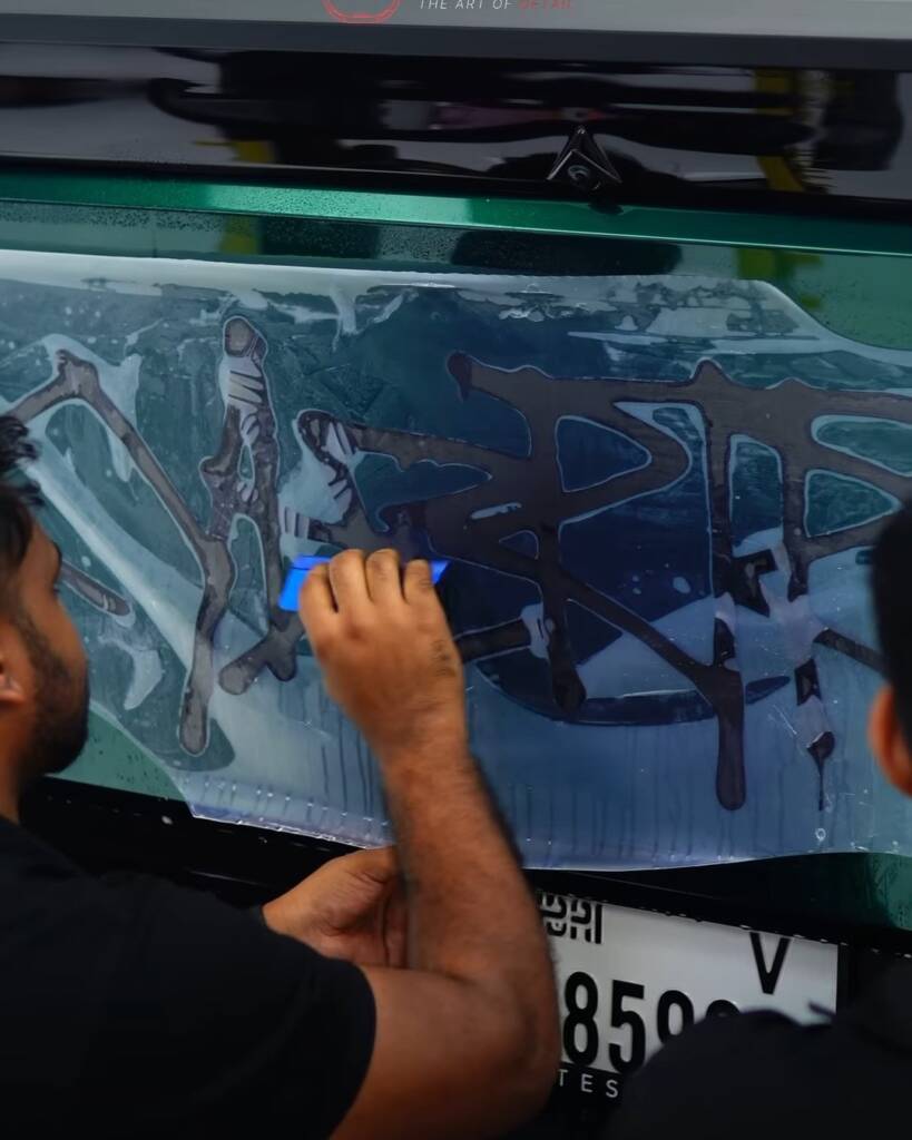 Green colour PPF worked across the Tesla Cybertruck tailgate around the CYBRTRK lettering