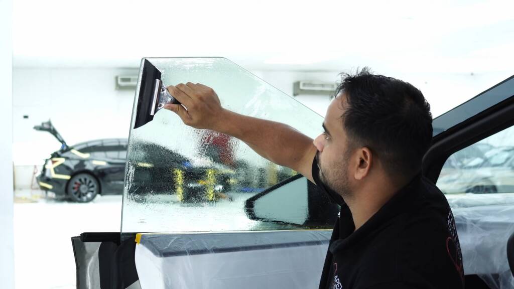 Trimming window tint on Tesla Cybertruck glass