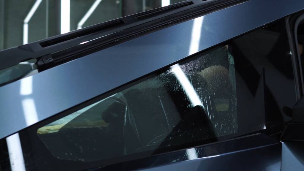 Tesla Cybertruck front door glass after window tint