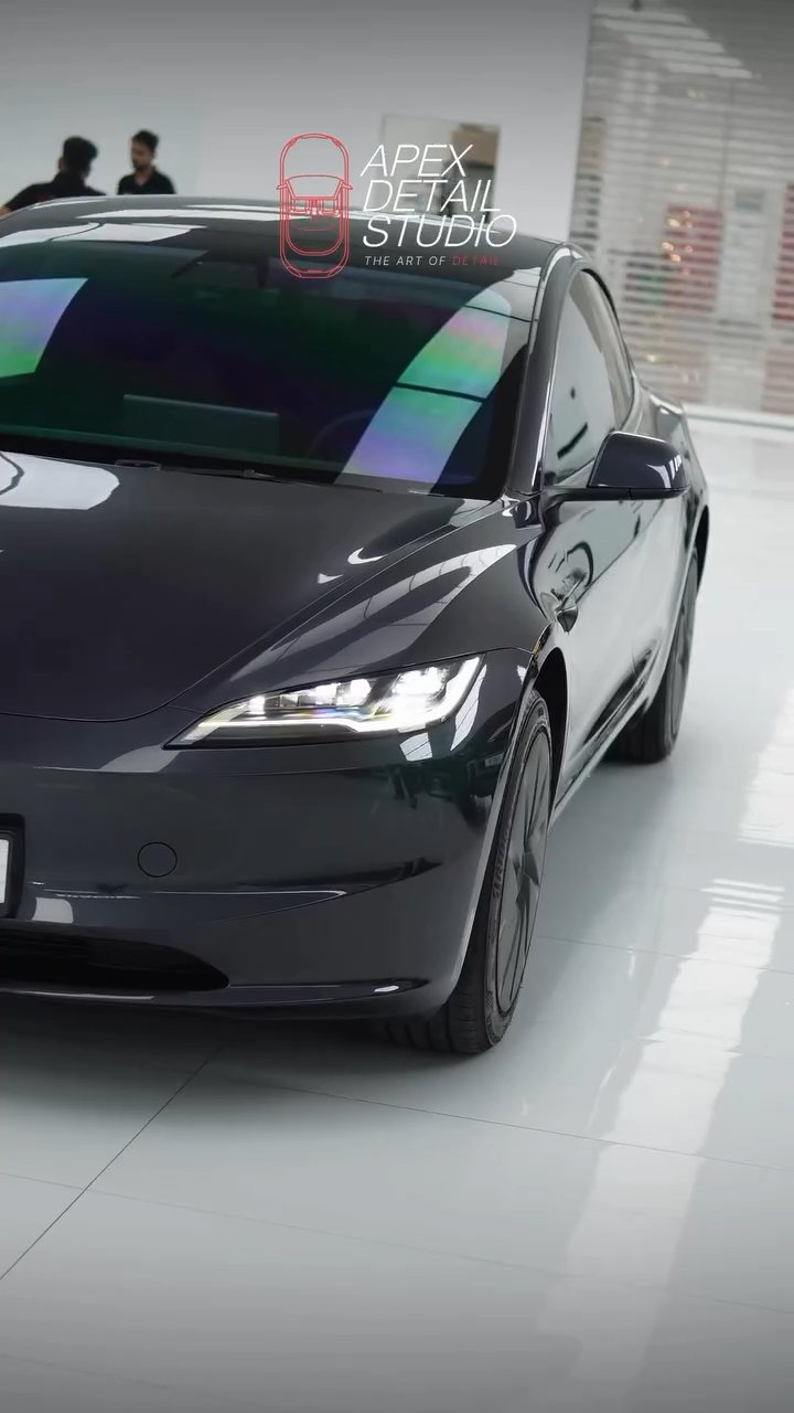Tesla Model 3 front three-quarter with new window tint at Apex Detail Studio Dubai