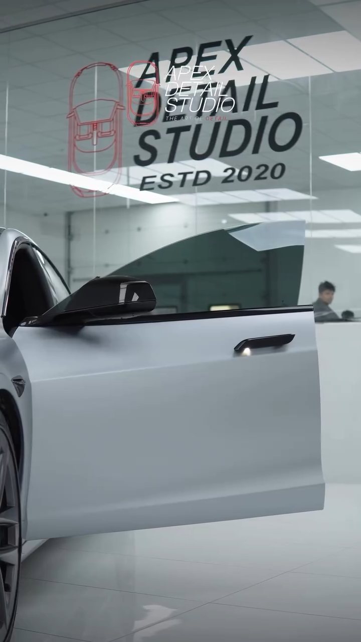 Tesla Model S Plaid with door open after window tint in the Apex studio, Dubai