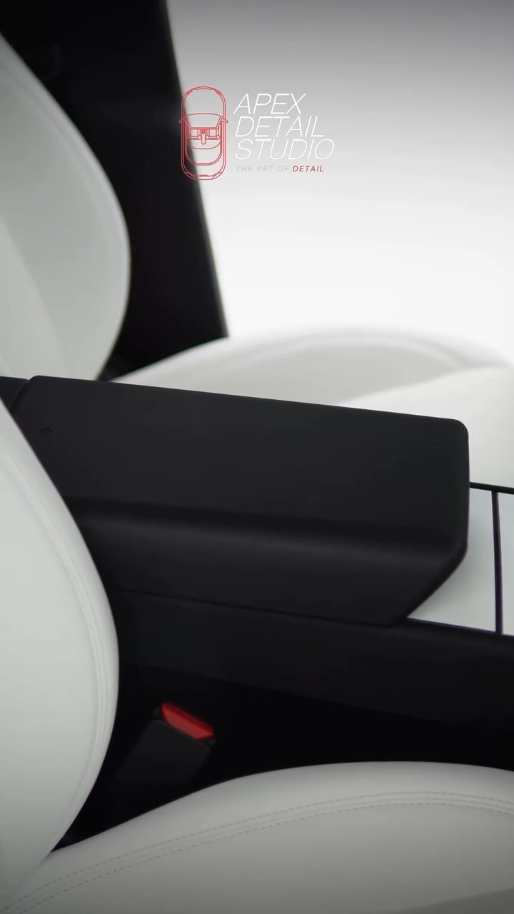 Tesla Model Y centre console and white seats after interior coating