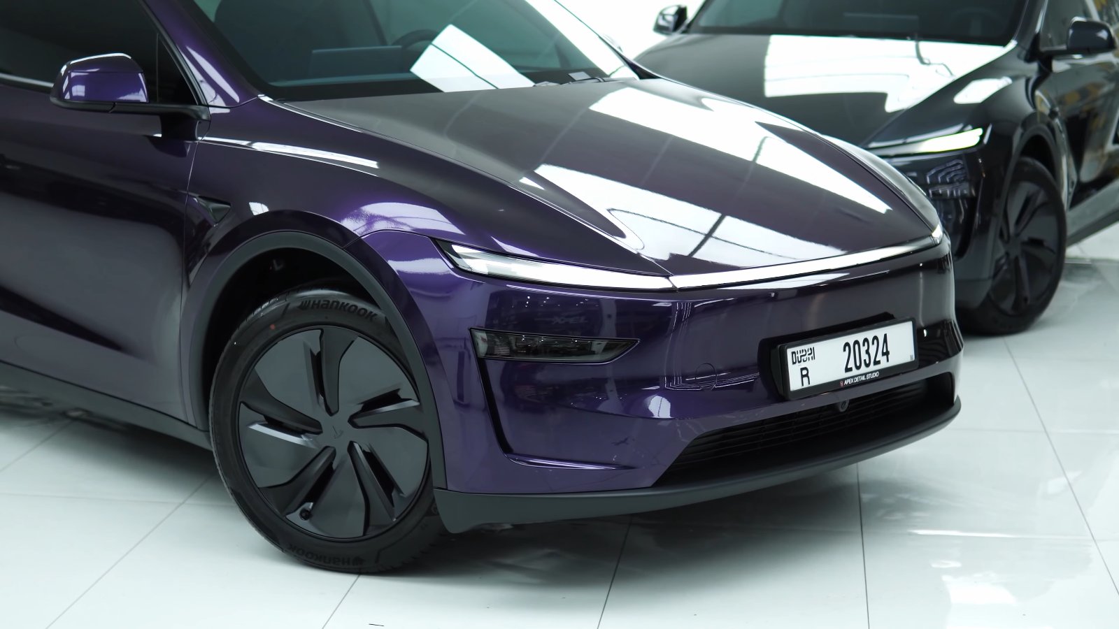 The same Tesla Model Y Juniper finished in midnight purple at Apex Detail Studio, Dubai