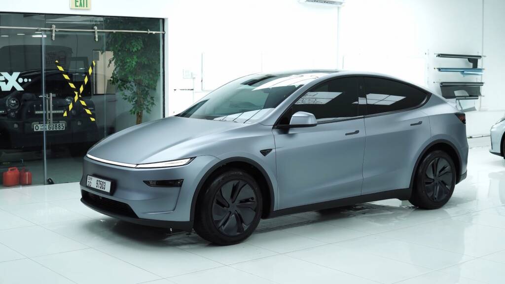 Satin Tesla Model Y Juniper front three quarter after PPF