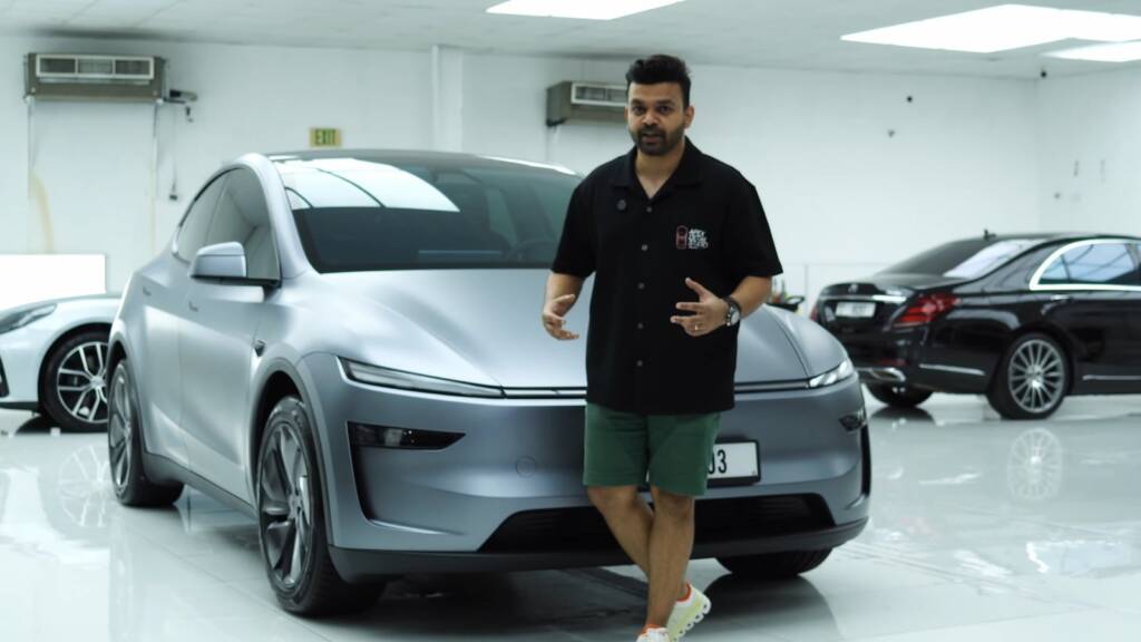 Side view walkround of a satin Tesla Model Y Juniper