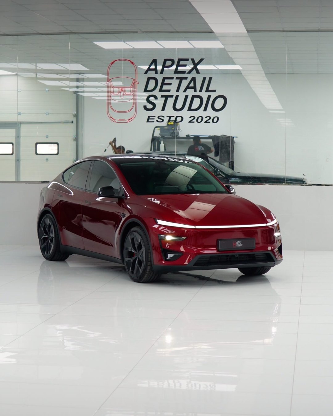 Tesla Model Y Performance, red, premium window tint and ceramic coating, at Apex Detail Studio in Dubai