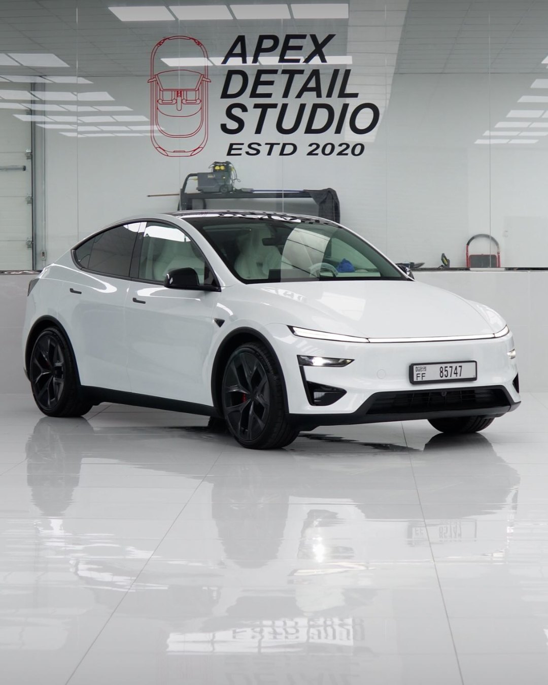 Tesla Model Y Performance, white, the first Model Y Performance in the UAE, in full PPF cut from custom precut patterns, at Apex Detail Studio in Dubai