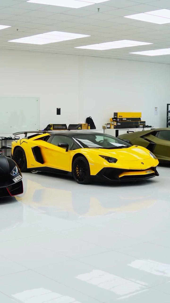 Yellow Lamborghini Aventador SV in the Apex Detail Studio showroom, Dubai